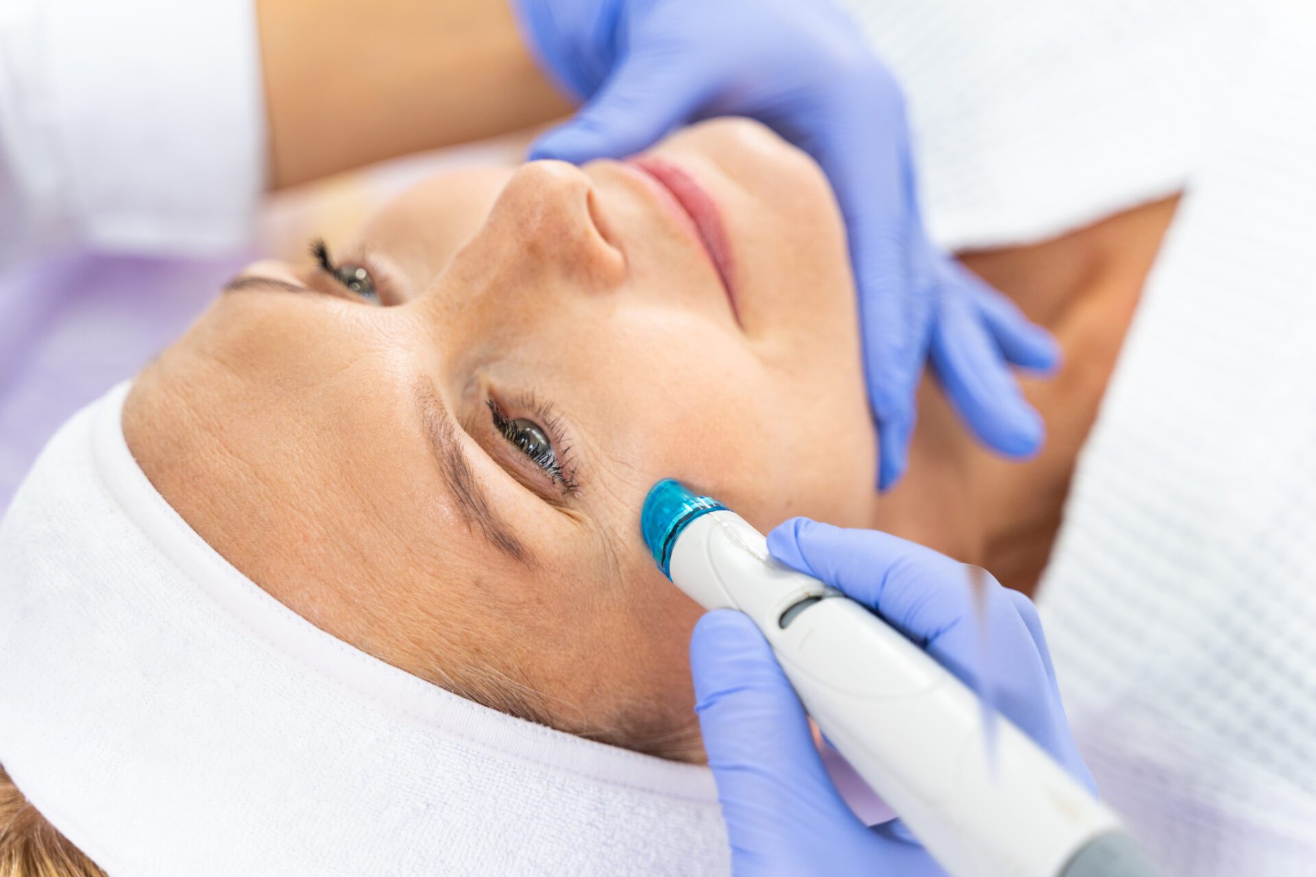 Female getting a professional facial in a salon